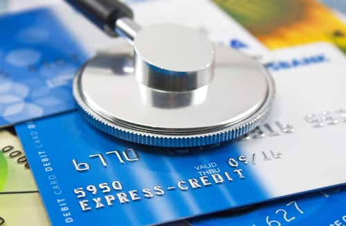 stethoscope on credit card