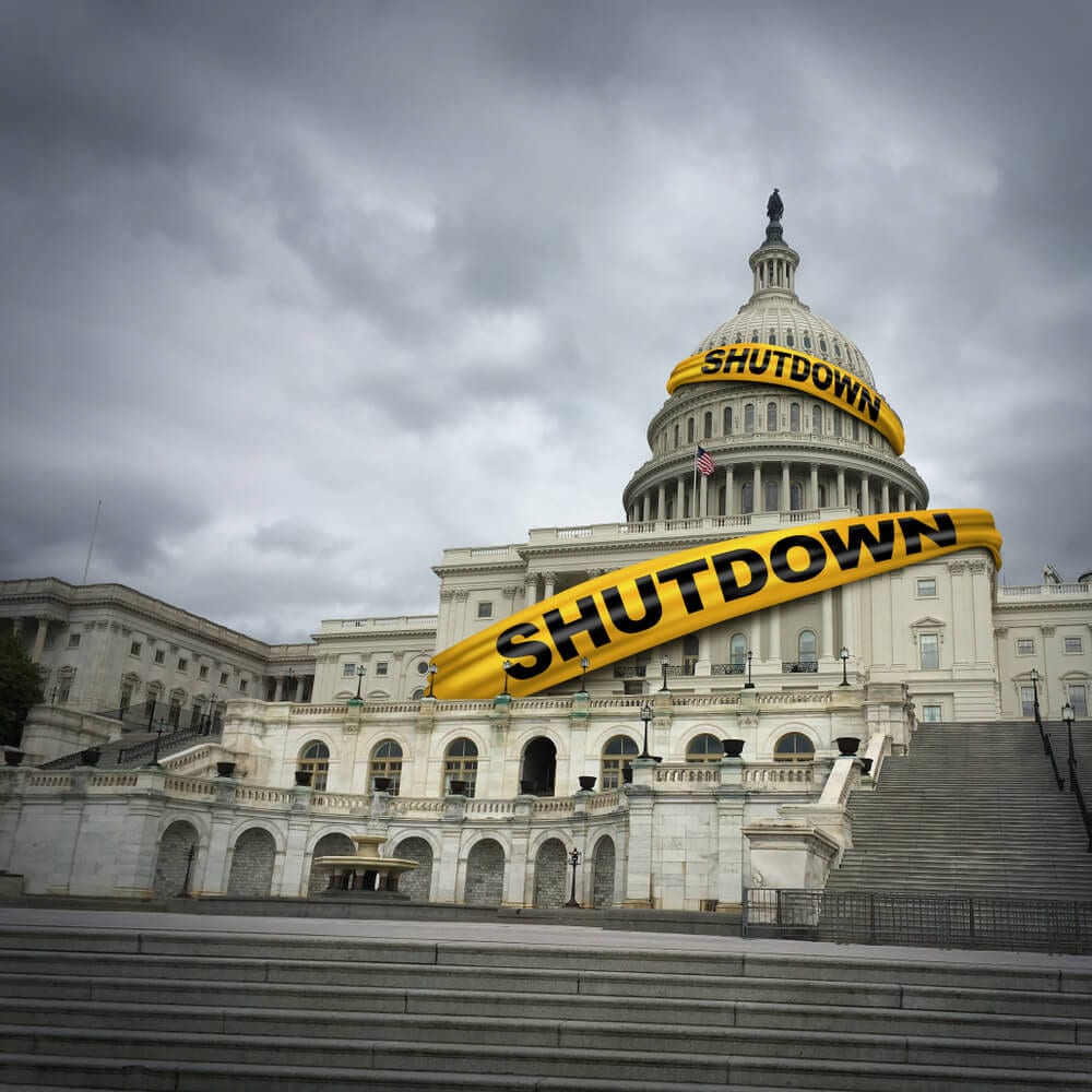 Capital building with yellow shutdown tape over it