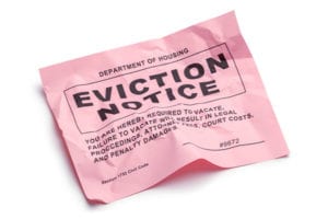 Eviction notice crumpled up on the floor