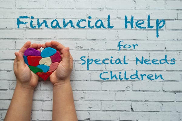 Kids hands forming a clay heart with text on wall that says "financial help for special needs children"